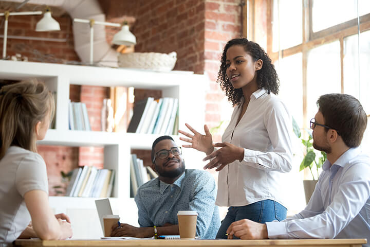 social issues investing, eclectic group of 4 people meeting